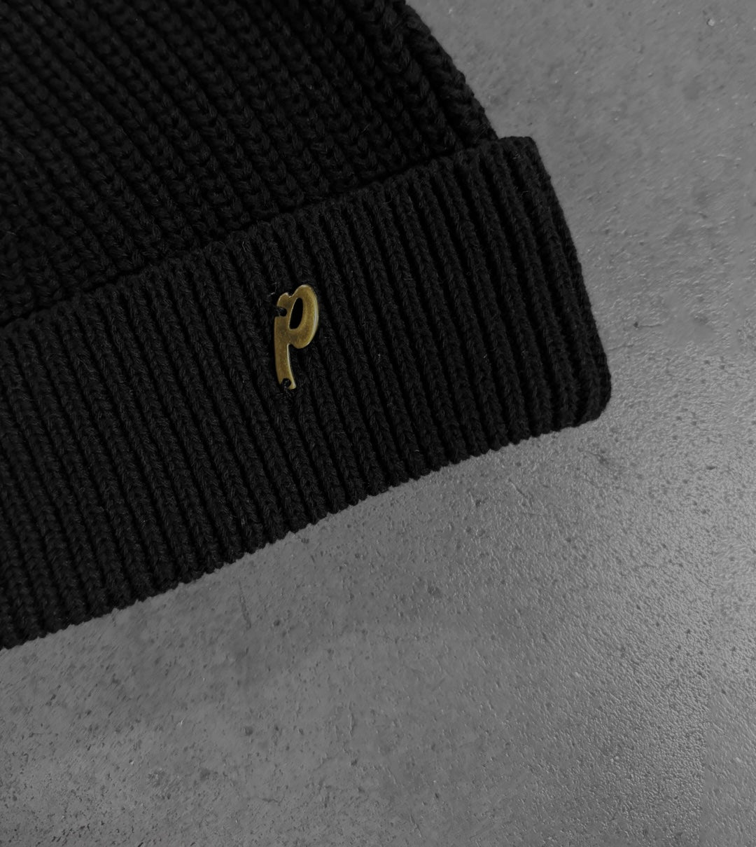 BLACK "P" BEANIE